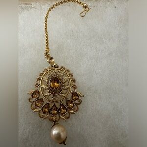 Jhumka, head piece